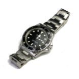 ROLEX, OYSTER PERPETUAL SUBMARINER, A VINTAGE STAINLESS STEEL GENT'S WRISTWATCH Having a rotating