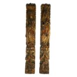 A PAIR OF 18TH/19TH CENTURY ECCLESIASTICAL CARVED WOOD PANELS Both deeply carved with two holy