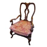 AN 18TH CENTURY FRUITWOOD OPEN ARMCHAIR With pierced vase splat backs, swept scrolling arms and