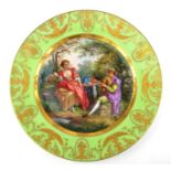 A FINE 19TH CENTURY VIENNA PORCELAIN CABINET PLATE Centrally painted with romantic pastoral scene,