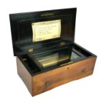 A LATE 19TH CENTURY SWISS FABRIQUE DE GENÉVE ROSEWOOD CASED ONE CYLINDER MUSICAL BOX Playing four