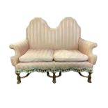 A LATE 19TH EARLY 20TH CENTURY WILLIAM AND MARY STYLE DOUBLE HUMP BACK TWO SEAT SETTEE With over-