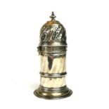 A VICTORIAN BRITANNIA SILVER CASTER Having a detachable pierced dome with fluted base, hallmarked