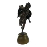 A 19TH CENTURY BRONZE FIGURE OF A WINGED ANGEL In trumpeting pose, with one foot raised, om a