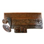 A MIXED GROUP OF 18TH CENTURY CARVED WOODEN PANELS Three rectangular, carved in deep relief with