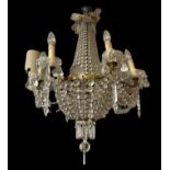 AN EARLY 20TH CENTURY SIX BRANCH BASKET CHANDELIER Hung with numerous crystals and prism drops. (