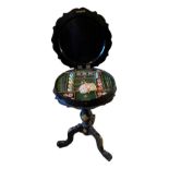 A 19TH CENTURY PAPIER-M CHÉ SEWING TABLE The circular top with hand painted floral and gilt