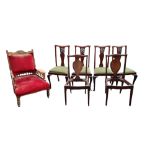 A SET OF FOUR EARLY 20TH CENTURY MAHOGANY DINING CHAIRS, In the Georgian style, with pierced back