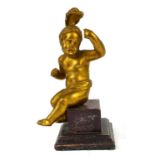 A 19TH CENTURY CONTINENTAL GILT BRONZE FIGURE OF A PUTTI Classical form solitary figure wearing a