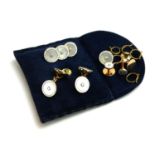 A SET OF 9CT GOLD, MOTHER OF PEARL AND DIAMOND CIRCULAR GENT'S CUFFLINKS AND DRESS STUDS With a