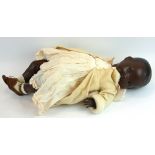A RARE LATE 19TH/EARLY 20TH CENTURY BLACK BISQUE HEADED DOLL Composition body, sleeping eyes and