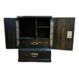 A 19TH CENTURY COROMANDEL TABLE TOP CABINET Having two brass carry handles, double doors and two