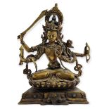 A NEPALESE GILT BRONZE SEATED BODHISATTVA WITH SWORD. (h 17cm)