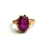 A RUSSIAN ROSE GOLD .583 AND LARGE SYNTHETIC RUBY COCKTAIL RING. (size S/T)