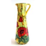 TUPTON WARE, A HAND PAINTED JUG Tubeline decorated with poppies on a yellow ground. (25cm)