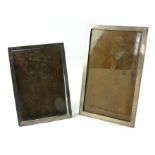 TWO EARLY 20TH CENTURY SILVER RECTANGULAR PHOTOGRAPH FRAMES Wth oak easel backs, hallmarked