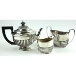 AN EARLY 20TH CENTURY SILVER BATCHELOR'S TEA SET Comprising a teapot, sugar basin and cream jug,