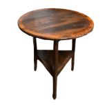 AN EARLY 20TH CENTURY PINE AND YEW WOOD BANDED CRICKET TABLE The circular top on three splayed