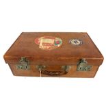 A VINTAGE STITCHED TAN LEATHER VANITY CASE Bearing various Cunard labels. (50cm x 31cm x 16cm)