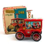 A MID 20TH CENTURY MERRY BALL BLOWER CIRCUS CAR With clock mechanism, made in Japan, in original