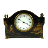 AN EARLY 20TH CENTURY CHINOISERIE MANTEL CLOCK Having four brass finials, hand painted decoration on