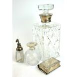 WITHDRAWN AN EARLY 20TH CENTURY SILVER AND ETCHED GLASS SCENT BOTTLE The bulbous body with