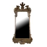 A 19TH CENTURY PIER MIRROR The silvered frame with Prince of Wales feather crest flanked by eagle