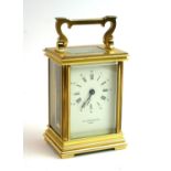 TAYLOR & BLIGH, LONDON, A BRASS EIGHT DAY CARRIAGE CLOCK Complete with key. (14cm) Condition: good