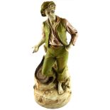 ROYAL DUX, A LARGE EARLY 20TH CENTURY AUSTRIAN PORCELAIN FIGURE OF A FISHERMAN With fishing
