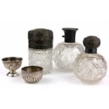 A COLLECTION OF THREE LARGE SILVER TOPPED GLASS BOTTLES including Walker & Hall 1923 Sheffield, C.C.