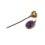 A VICTORIAN YELLOW METAL, AMETHYST AND SEED PEARL PENDANT Yellow metal assessed as 9ct, together