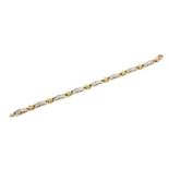 AN 18CT WHITE AND YELLOW GOLD DIAMOND BRACELET Nine links, each set with five brilliant round cut