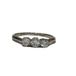 A 18CT WHITE GOLD THREE STONE DIAMOND RING. Gross weight- 2.3g