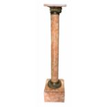 A 19TH CENTURY PINK MARBLE AND GILT METAL MOUNTED COLUMN WITH CORINTHIAN CAPITAL Raised on plinth