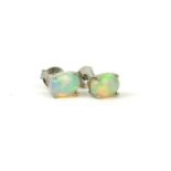 A PAIR OF SILVER OPAL STUDS.