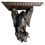 A LARGE FINE LATE 19TH CENTURY BLACK FOREST WALL BRACKET Carved in good details with an eagle