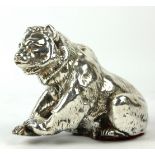 AN EARLY 20TH CENTURY CONTINENTAL (POSSIBLY SILVER COVERED MODEL) OF AN AMERICAN SEATED BEAR