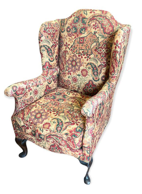 AN EARLY 20TH CENTURY GEORGIAN STYLE CHILDS WING ARMCHAIR The later fabric upholstery figured with