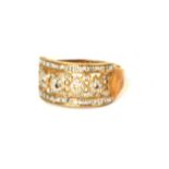 A VINTAGE 9CT GOLD AND DIAMOND CLUSTER RING The arrangement of diamonds in a geometric pierced