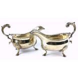 A MATCHED PAIR OF GEORGIAN SILVER SAUCE BOATS Classical form with beaded edge, hallmarked London,