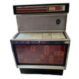 A VINTAGE 60S ROWL AMI JUKEBOX Chrome aluminum and glass, complete with records and keys. (w 82cm