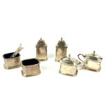 AN EARLY 20TH CENTURY SILVER SIX PIECE CRUET SET Comprising two salts, two peppers and two mustard