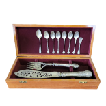AN ENGLISH HALLMARKED SILVER CAKE SLICE AND FORK Along with a set of six silver shell spoons and two