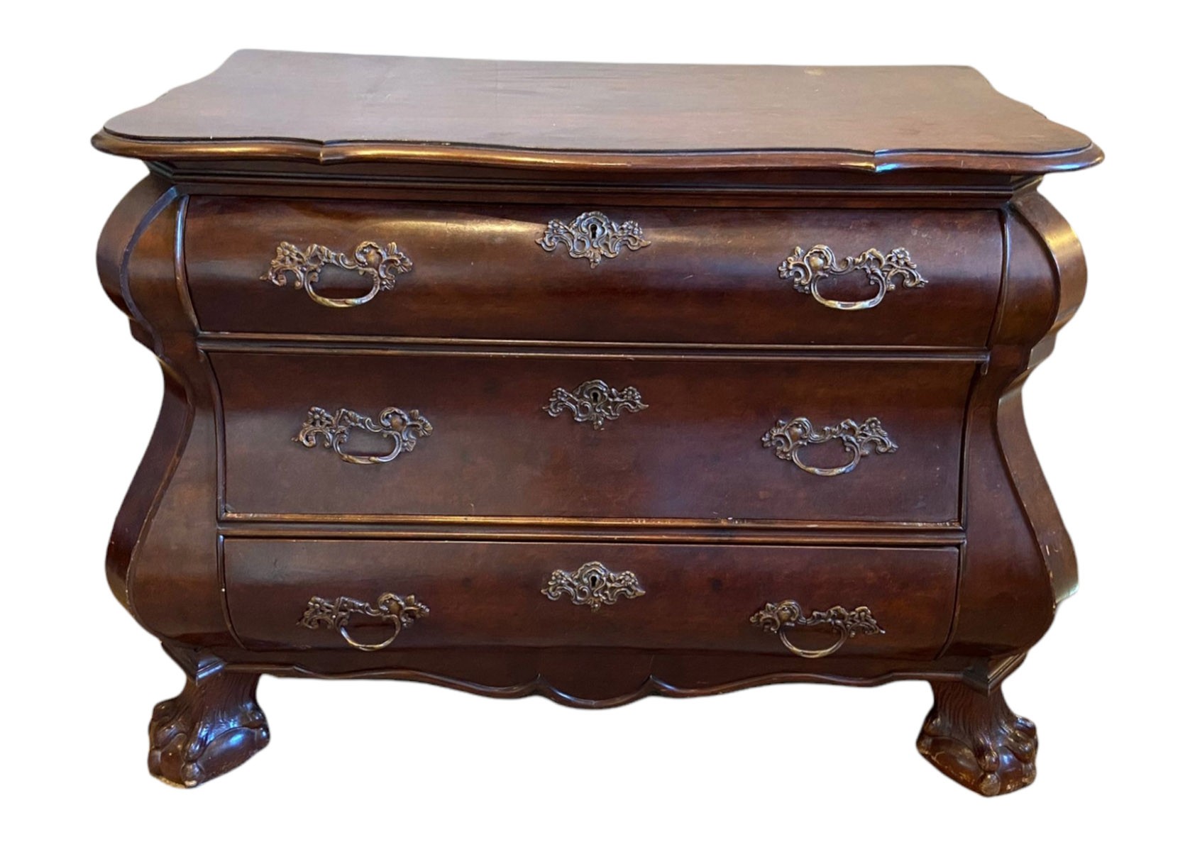 AN 18TH CENTURY STYLE DUTCH WALNUT BOMBE COMMODE With three drawers fitted with brass furniture