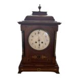 A LATE 19TH CENTURY FRENCH MAHOGANY CASED BRACKET TABLE CLOCK The white enamel circular dial, Arabic