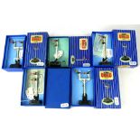 HORNBY DUBLO, A COLLECTION OF FIVE DIE CAST ELECTRIC SIGNALS In blue boxes. Condition: good, some