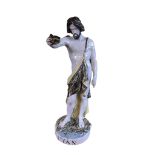 A LATE 19TH/EARLY 20TH CENTURY FRENCH FAIENCE STATUE, ST. JOHN THE BAPTIST Holding a bowl of