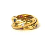 CARTIER, AN 18CT GOLD, DIAMOND, SAPPHIRE AND RUBY PUZZLE RING Three entwined bands set with round