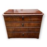 A 19TH CENTURY CONTINENTAL FLAME MAHOGANY CHEST OF THREE LONG DRAWERS Fitted with a caddy top and