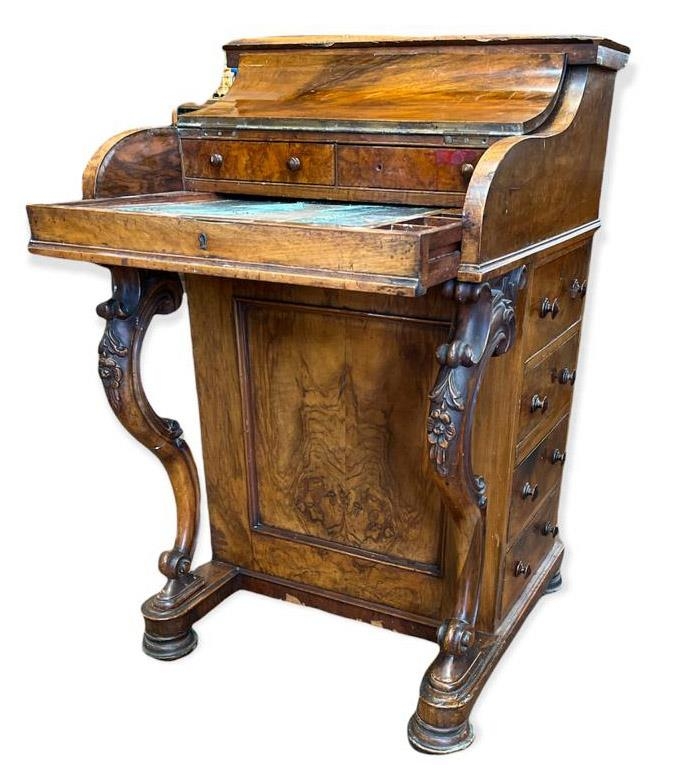 A VICTORIAN WALNUT POP-UP PIANO FRONT DAVENPORT DESK The fitted interior above carved cabriole